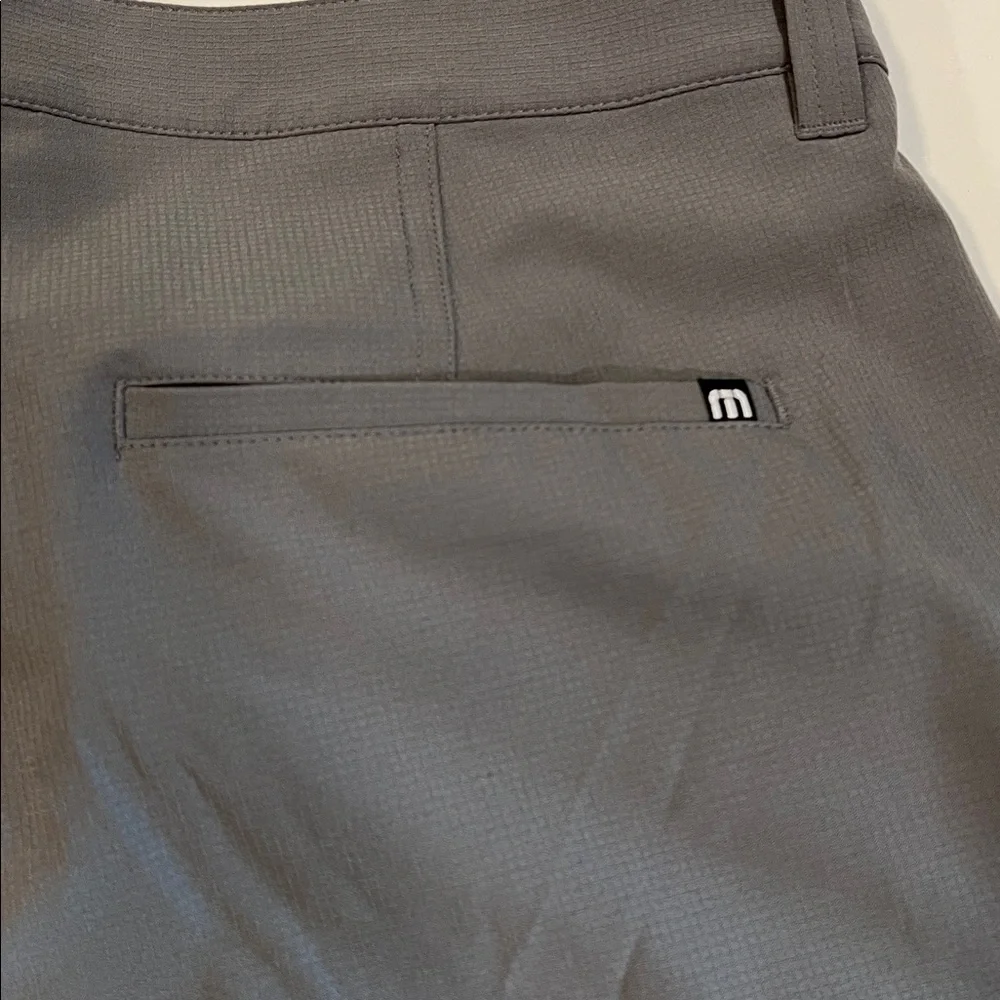 Travis Mathew - 38, light weight gray flat front‎ shorts